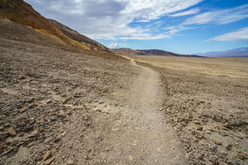 hikink the golden canyon - gower gulch circuit in death valley, california, usa