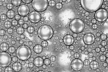 Oil and water abstract macro closeup  in silver