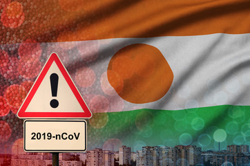 Niger flag and Coronavirus 2019-nCoV alert sign. Concept of high probability of novel coronavirus...
