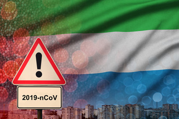 Sierra Leone flag and Coronavirus 2019-nCoV alert sign. Concept of high probability of novel...