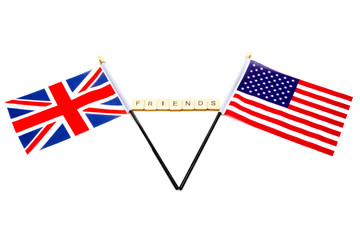 The flags of the United Kingdom and the United States isolated on a white background with a sign reading Friends