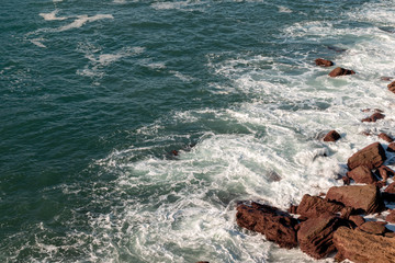Rocky sea shore seen from the heights in Donostia, San Sebastian, Spain