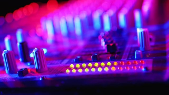 LED Indicator Level Signal of Volume on the Sound Mixing Console or Dj Console on the Party in Nightclub.