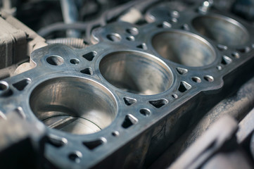 Engine block in a car. Disassembled car for repair.