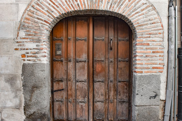 Fototapeta na wymiar Unusual and ancient doors in Segovia Spain