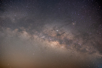 At night have stars, milky way and galaxies filled the dark sky.