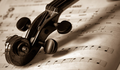 Close-Up Of Violin And Sheet Music