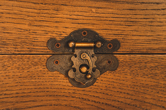 Vintage Authentic Brass Antique Castle Latch On A Makeshift Oak Wooden Box.