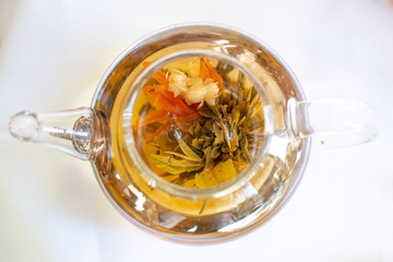 Flowering Tea in Clear Tea Pot