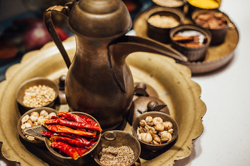 Mix of spices pepper, garlic. Paprika on the kitchen table. various kinds of spices in bowls - herbs and spices