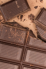 Huge bar of chocolate is broken into pieces