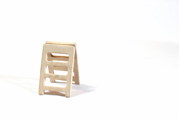 Wooden ladder toy on white background.