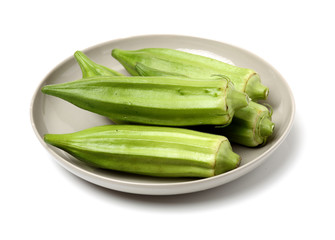 Fresh young okra isolated on white background