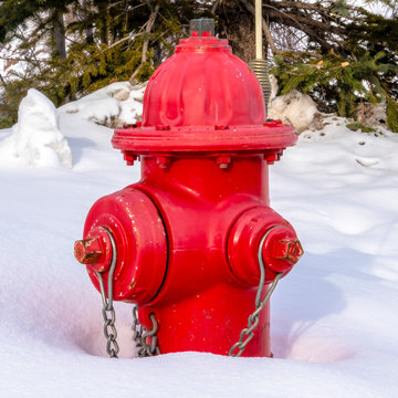 Photo Square frame Vibrant red fire hydrant against fresh snow during winter in Park City Utah