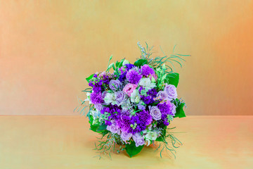 beautiful bouquet of flowers, lilac and white roses with green leaves