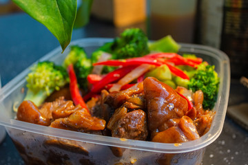 Braised pork trotters.  Green broccoli.  Red pepper.  Delicious Chinese food.  healthy food.  Good for the skin