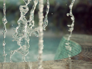 Naklejka na ściany i meble Close-Up Of Water Splashing At Poolside
