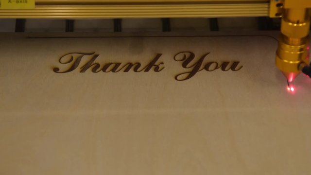 Laser machine finishing wood product