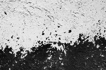 Texture of a concrete wall with cracks and scratches which can be used as a background