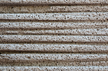 Texture and porosity of concrete surfaces.