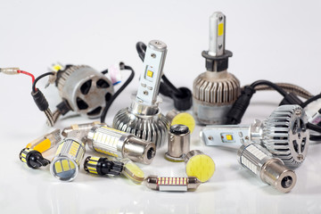Light bulbs for car lamps. Automotive part in Silvery metallic and black color with wires and connecting elements
