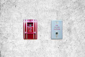 Pull in case of fire switch and fire firefighters telephone in let is mounted on the wall for fire...