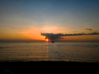 calming sunset on beach, bali - indonesia