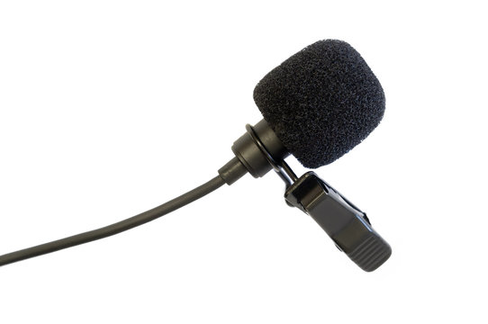 Black lavalier microphone closeup on a white background