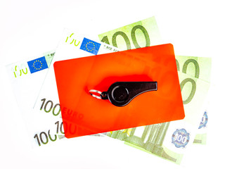 Warning cards and money of a football referee.. Corruption of a football referee for money. Money....