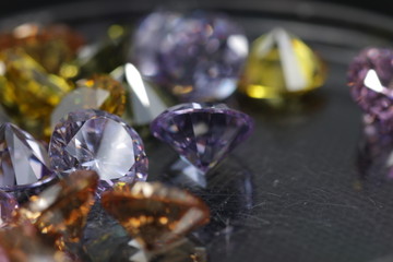 Close up shot of beautiful multi color crystal zirconia diamonds beads for jewelry 