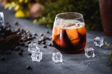 Ice coffee on rustic background