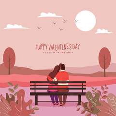 Back View of Young Lover Couple Hugging Sit on Bench with Evening Nature Scene Background.