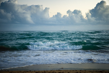 Close up of a wavy sea in the Caribbean, blue water, white foam, waves. Relaxing view.