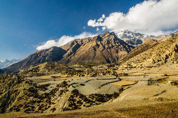 Ngawal village against Mt. Chulu (far east). Marshyangdi river valley, Annapurna circuit trek, Nepal.