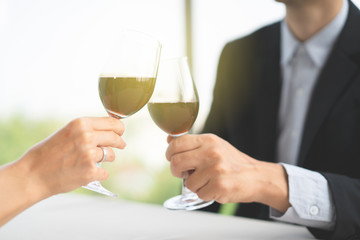  husband and wife having a lunch at restaurant in valentine's day