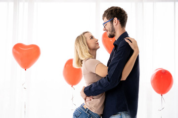 Fototapeta na wymiar Young caucasian couple portrait in romantic moment together. Romantic couple in Valentine's day concept.