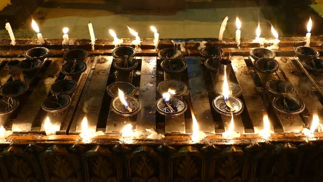 Candles at Shwedagon pagoda in Yangon, Myanmar