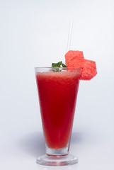 Melon juice blended in a tall glass Summer drink On a white background