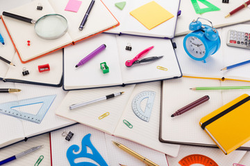 notepad or notebook with school supplies