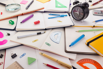 notepad or notebook with school supplies