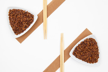 Top View Of White Sushi Plate With Rise And Chopsticks.