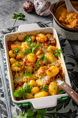 Gratinated gnocchi with cheese