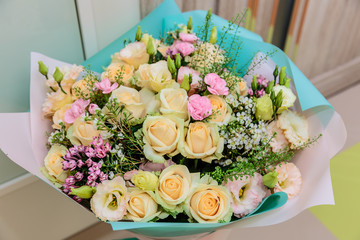 A bouquet of delicate cream-colored roses