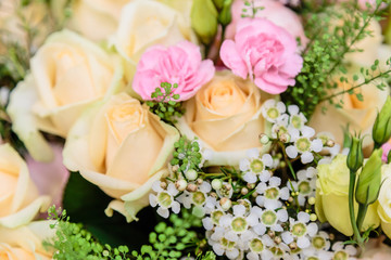 A bouquet of delicate cream-colored roses