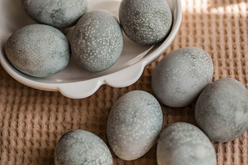 Сolored eggs for Easter. Beautiful light blue eggs. Easter background. 