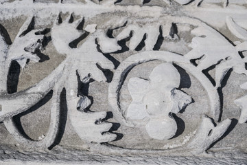 Decorative element of an antique marble column.