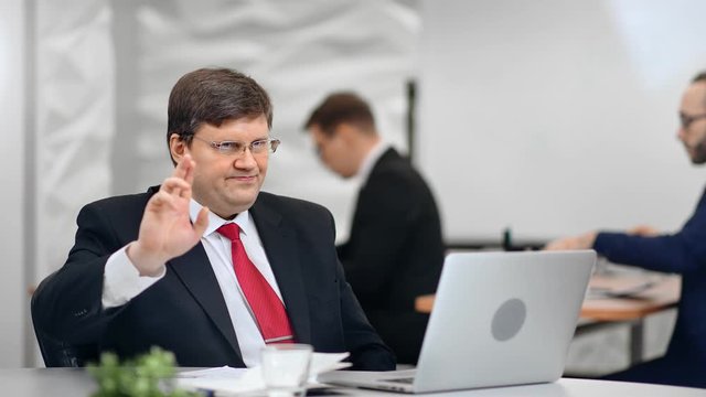 Annoyed male boss in suit showing gesture reject saying no at office routine background