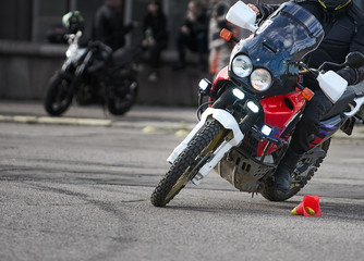 Adventure rider traveling, outdoor shot. Strong grain.