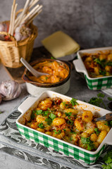 Gratinated gnocchi with cheese