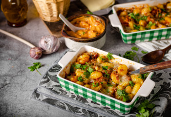 Gratinated gnocchi with cheese